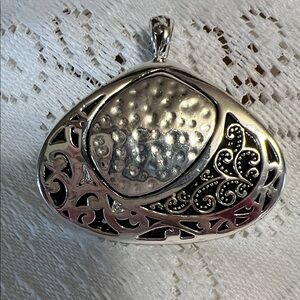 Silver Metal Southwest Style Pendant with Intricate Design